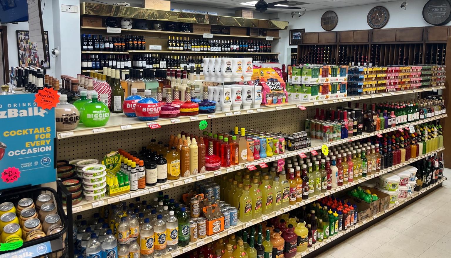 Aisle of wine and spirits shelves inside Stanley's Liquor & Wine in Jackson