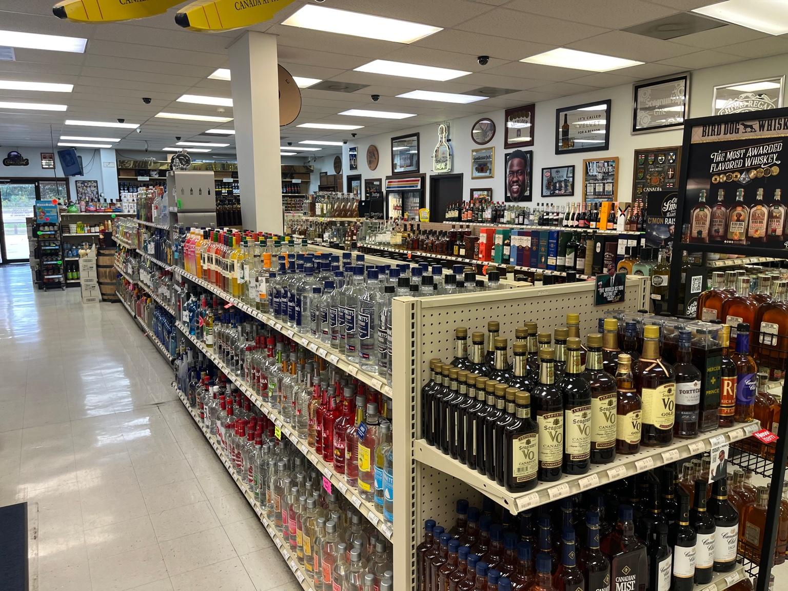 Shelves with a variety of spirits inside Stanley's Liquor & Wine in Jackson