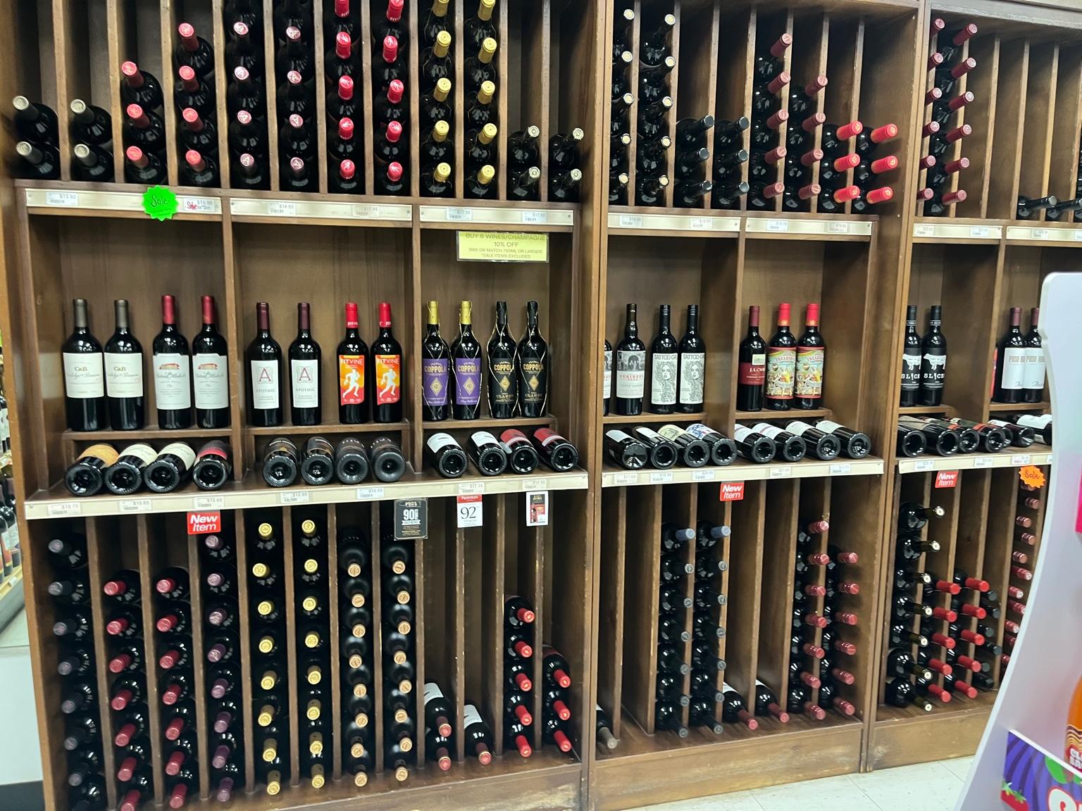 Wine bottles on wooden racks inside Stanley's Liquor & Wine in Jackson